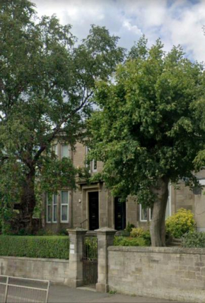 Birchwood, elevated first floor, superior, spacious traditional 2 double room apartment, Glasgow. 10 min drive to city centre. Private secure parking space. Property set within beautiful Tollcross Par